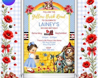 May include: A rectangular birthday invitation card featuring a Wizard of Oz theme with a yellow brick road, a girl in a blue gingham dress, a tin person, a lion, and a scarecrow. The text reads Follow the Yellow Brick Road to celebrate Lainey's second birthday.