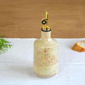 Ceramic olive oil dispenser set for slow living homes handmade oil cruet pair for rustic kitchen decor thoughtful cooking gift for kitchen