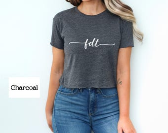Top corto anti-Trump de FDT: camiseta de bebé con sutil resistencia y protesta