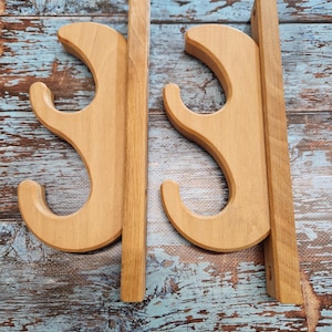 Soporte de pared de madera para colgar remos #1