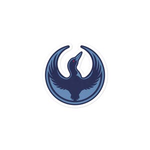 May include: A sticker featuring a stylized bird with outstretched wings, in shades of blue. The bird has a red eye and is set against a white background. The design is circular and appears to be a logo or emblem.