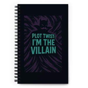 May include: Black spiral notebook with a purple and black swirl design. The notebook has a silhouette of a devil with a mustache and the text "PLOT TWIST: I'M THE VILLAIN" in teal.