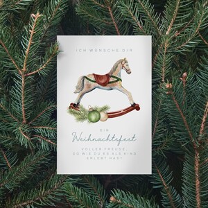 Postkarte mit Schaukelpferd - Grußkarte - Karte in Aquarelloptik - Geschenkidee für Weihnachten - besondere Weihnachtskarte mit Spruch