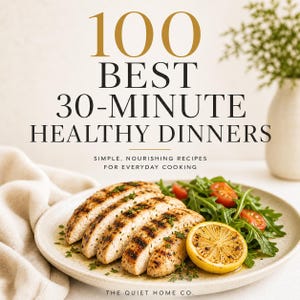 May include: A cookbook cover with the title "100 Best 30-Minute Healthy Dinners" in gold lettering. The image features sliced grilled chicken, salad, and a lemon wedge on a plate. The text "Simple, Nourishing Recipes for Everyday Cooking" is also visible.