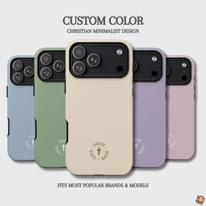 May include: Five smartphone cases in blue, green, beige, purple, and pink, each featuring a black camera module and a circular emblem with a cross and the words FAITH, LOVE, and HOPE. Text reads CUSTOM COLOR CHRISTIAN MINIMALIST DESIGN.