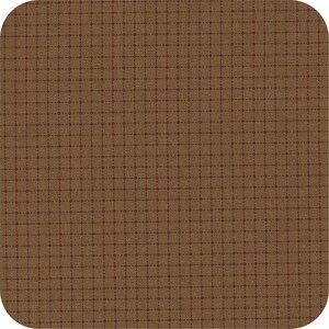 May include: A square, brown fabric with a grid pattern of maroon lines. The corners of the fabric are rounded. The fabric has a textured appearance.
