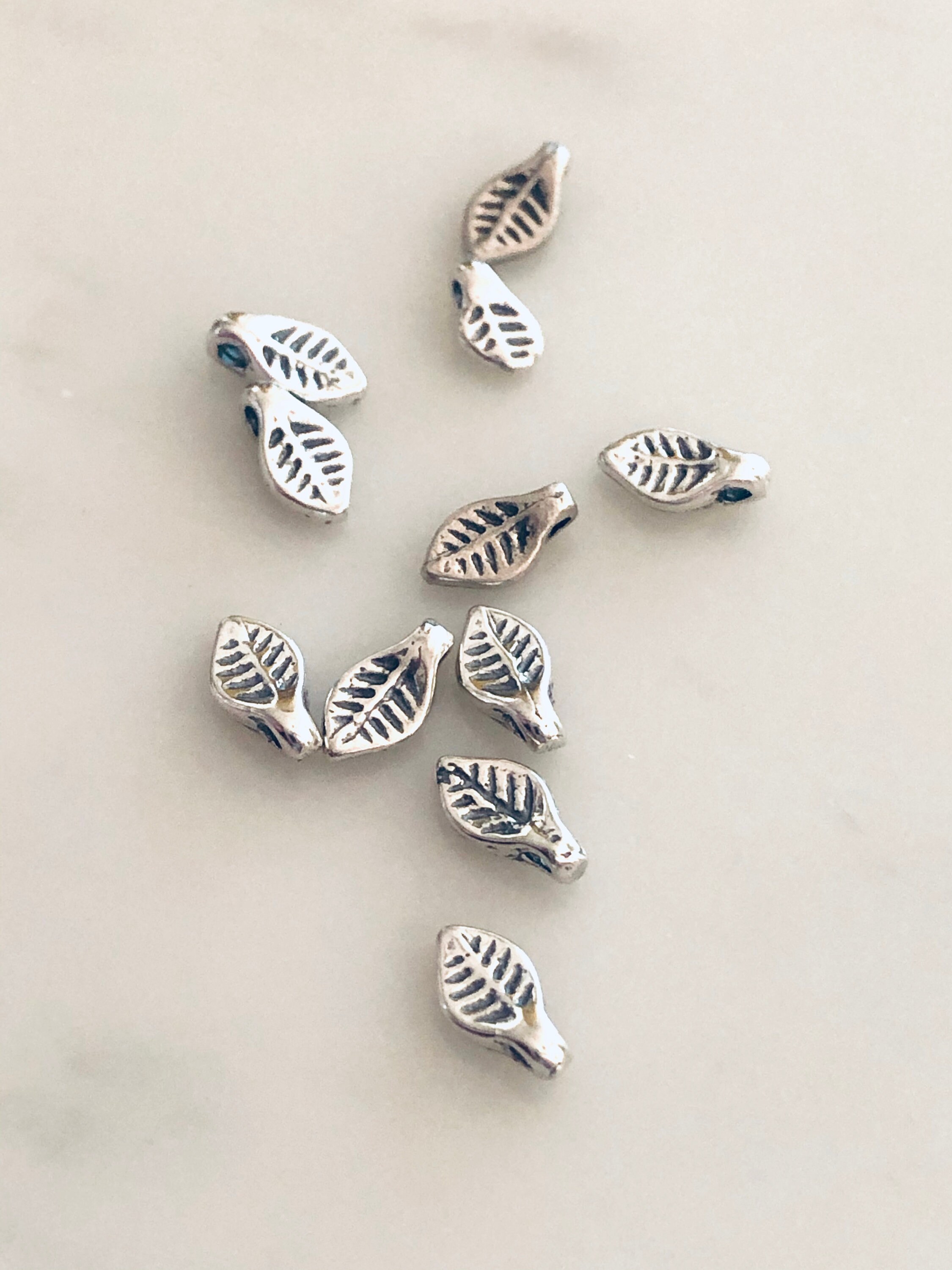 Leaves THREE Tiny Sterling Silver Charms