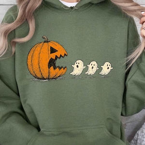 Ghost Chasing Pumpkin Funny Halloween Sweatshirt: Retro Pac Man Style Design