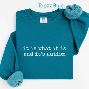 It Is What It Is And It's Autism Shirt, Topaz Blue Sweatshirt, Autism Awareness Clothing, Cozy Unisex Sweater, Gift For Support