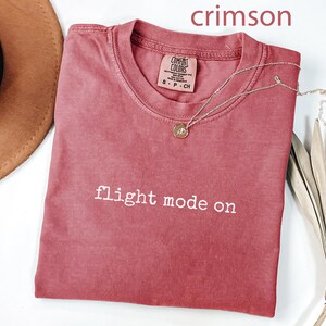 Flight mode on shirt, crimson graphic tee, casual travel wear, vacation outfit, adventure mode t-shirt, comfy travel apparel