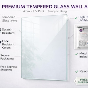 The image is a promotional graphic for premium Tempered Glass Wall Art. It features a close-up view of a glass panel with various features highlighted, such as UV print, scratch resistance, fade resistance, secure packaging, and a metal hanger included. The image also includes a QR code and a free shipping label, indicating that the product is ready to hang and can be easily ordered online.