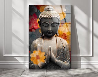May include: A vertical wall art print featuring a gray Buddha statue with closed eyes and hands pressed together in a prayer position. The statue is set against a backdrop of large, vibrant yellow and red floral patterns.