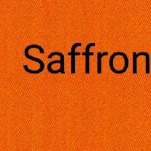 May include: Close-up of a textured, saffron-colored fabric. The word "Saffron" is printed in black, centered on the fabric. The fabric's weave is visible, adding depth to the image.