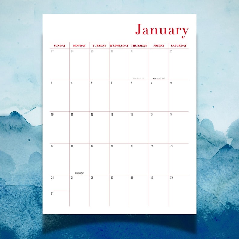 May include: A white calendar page for the month of January with red text for the month name and days of the week. The grid features black numbers for dates, with small text indicating New Year's Day and MLK Day within the grid squares.