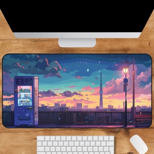 May include: A colorful pixel art style mousepad featuring a cityscape at sunset with a vending machine, a street lamp, and a tall tower in the distance. The sky is a gradient of pink, orange, and blue with stars.