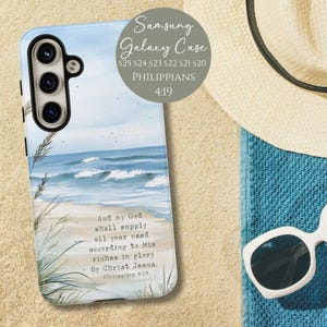 May include: A Samsung Galaxy phone case featuring a watercolor beach scene with ocean waves and sand. The case includes the text "And my God shall supply all your need according to His riches in glory by Christ Jesus. Philippians 4:19."