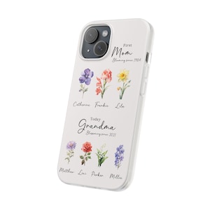May include: White phone case with a floral design and the text "First Mom Blessing since 1984" and "Today Grandma Blessing since 2021".