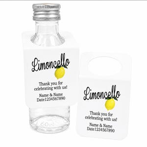May include: A clear glass bottle with a silver screw cap and a white rectangular tag hanging from the neck. The tag features the text Limoncello, a yellow lemon illustration, and the words Thank you for celebrating with us! Name & Name Date 1234567890.
