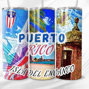 May include: Three stainless steel tumblers with colorful designs featuring Puerto Rican imagery. The designs include a conga drum, a palm tree, a beach, a building, and a frog. The tumblers have the text "PUERTO RICO" and "ISLA DEL ENCANTO" printed on them.