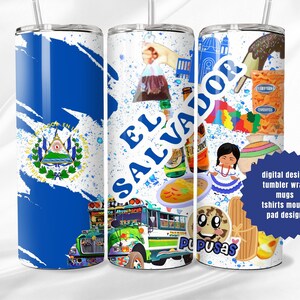 May include: A white tumbler with a blue and white design featuring the flag of El Salvador, a school bus, pupusas, and other cultural elements. The text "El Salvador" is written in blue letters on the tumbler.