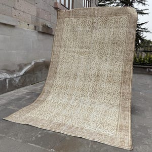 Vintage Turkish Oushak Rug: 5.5x9 ft, Pastel Tribal Area Rug