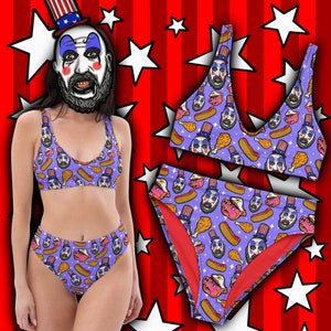 May include: A purple and blue bikini with a pattern of a clown wearing a red, white, and blue hat, hot dogs, and fried chicken. The bikini top and bottom have a red lining.