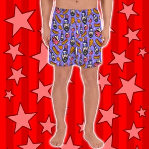 May include: Purple boxer shorts with a repeating pattern of a cartoon character wearing a red, white, and blue hat and a variety of food items, including hot dogs, fried chicken, and cupcakes.