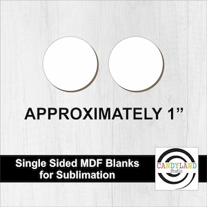 May include: Two white, round MDF blanks, approximately 1 inch in diameter, for sublimation. The text "APPROXIMATELY 1"" is displayed above the blanks. Below, the text reads "Single Sided MDF Blanks for Sublimation". The Candyland Studio logo is in the bottom right corner.