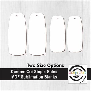 May include: Four white MDF sublimation blanks in two sizes, with rounded edges and a hole at the top for hanging. The image includes the text "Two Size Options" and "Custom Cut Single Sided MDF Sublimation Blanks."