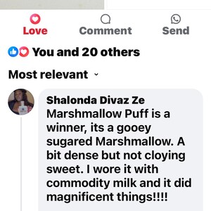 May include: A clear glass bottle labelled "LAYERZ OF ILLUSIONS Marshmallow PUFF" is shown. The image is a screenshot of a social media post with a customer review. The post includes a shop discount and order total.