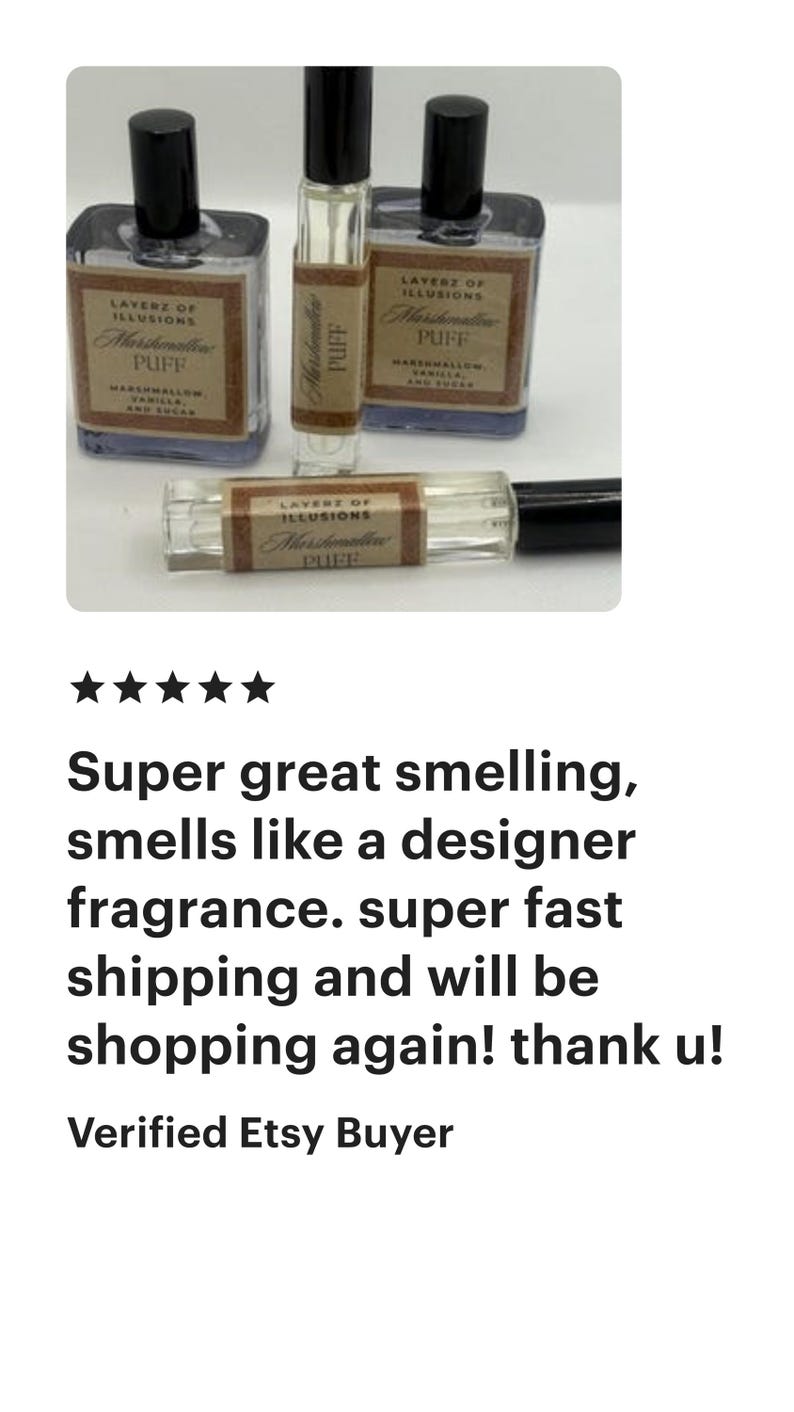 May include: A selection of perfume bottles and a rollerball. The clear bottles have black caps and labels reading "Layers of Illusions Marshmallow Puff." The rollerball also has this label. The fragrance is described as smelling great.