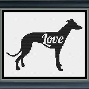 May include: Black silhouette of a greyhound dog with the word "Love" written inside the silhouette.