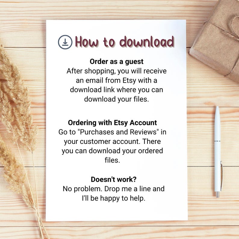 May include: A white sheet of paper with the title "How to download" and instructions for downloading files from Etsy. The paper is on a wooden surface, with a pen and a wrapped gift nearby.