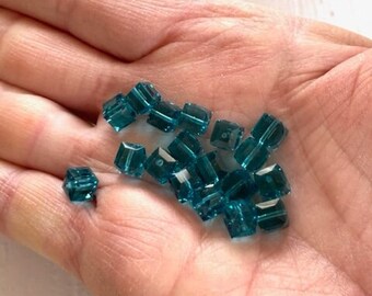 Teal Blue Swarovski Crystal Cubes - (18) 7mm Teal Blue Swarovski Crystal Cubes - Beading Supplies