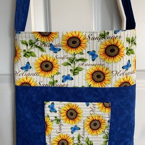 Tas in festivalstijl met zonnebloem en vlinder