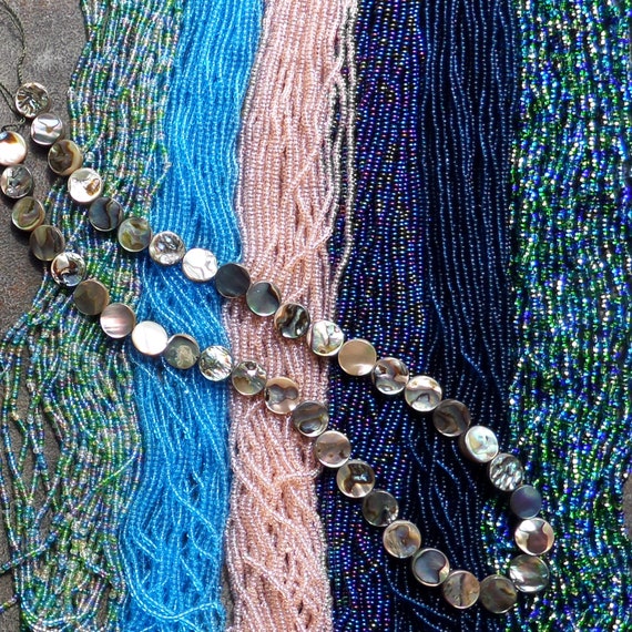 Czech Glass Seed Beads Size 11//0 Aqua Lined Iris