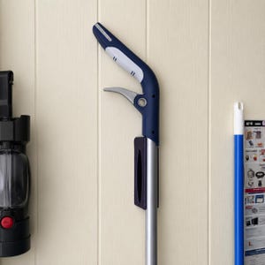 May include: A cleaning tool handle featuring a dark blue and white ergonomic grip with a silver metallic shaft and a silver trigger mechanism. The handle is designed for a mop or similar cleaning device, showcasing a sleek, functional construction.