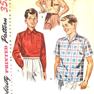 May include: A vintage sewing pattern for boys' shirts. The pattern includes three different shirt styles: a red striped shirt, a blue plaid shirt, and a solid white shirt. The pattern is printed on a white background with pink text. The pattern number is 4543 and the size is 4.
