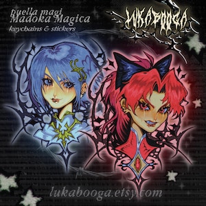 May include: Two anime-style character illustrations with a gothic aesthetic. The character on the left has blue hair and is wearing a light blue and gold outfit. The character on the right has pink hair and is wearing a red and black outfit. Both characters have black outlines and are set against a black background with white stars.