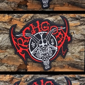 May include: Three black embroidered patches with a white or red design. The design features a circle with a goat head inside and the word "Behemoth" written around the circle.