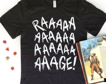 May include: Black t-shirt with white text that reads "RAAAAAAAA AAAAAAAA AAAAAAGE!"