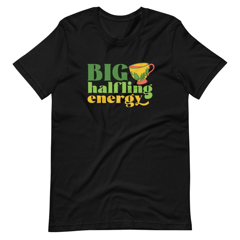 May include: Black t-shirt with green and yellow text that reads "BIG halfling energy" and a cartoon image of a teacup.