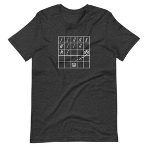 May include: A dark heather grey t-shirt with a white graphic of a grid with the words "FLANK WITH ME" and a dice symbol.