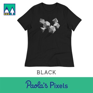 May include: Black women's t-shirt with a graphic of geometric shapes in shades of gray.