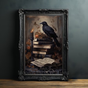 May include: A black raven perched on a stack of antique books with a lit candle and autumn leaves in a dark, moody setting. The image is framed in a black ornate frame.