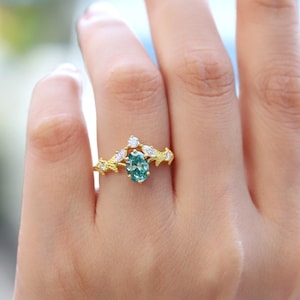 Green Moissanite Pear Cut Engagement Ring: 14k Gold Leaf Design