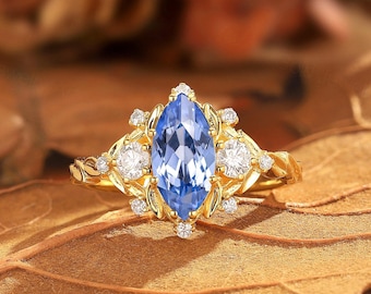 Vintage Cornflower Sapphire Engagement Ring: Marquise Moissanite Leaf Ring