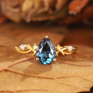Vintage pear shape Alexandrite engagement ring Nature inspired leaf wedding ring 14k gold promise ring Unique moissanite Anniversary gift