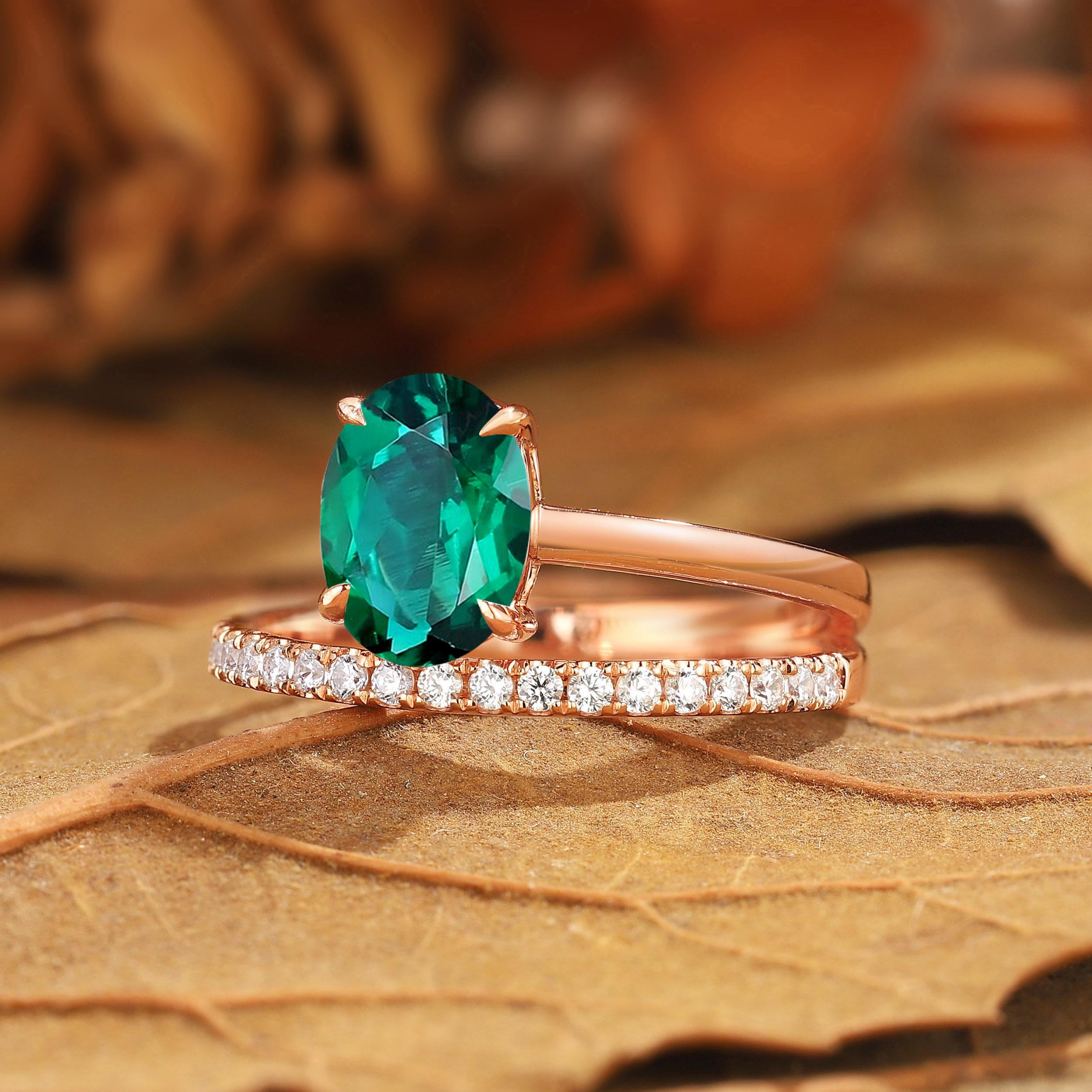 繊細なオーバルエメラルドエンゲージリング：ダブルハローモアッサ