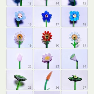 Può includere: Una collezione di 45 figurine di fiori e piante in vetro. Le figurine sono disposte in una griglia e sono numerate da 1 a 45. Le figurine sono realizzate in vetro trasparente, colorato e testurizzato. Le figurine sono tutte di forme e dimensioni diverse. Le figurine sono tutte su uno sfondo bianco.